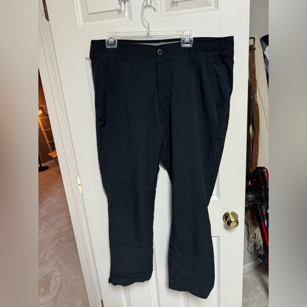 Black Under Armour golf pants - size 40/32 leg length is more of a 30